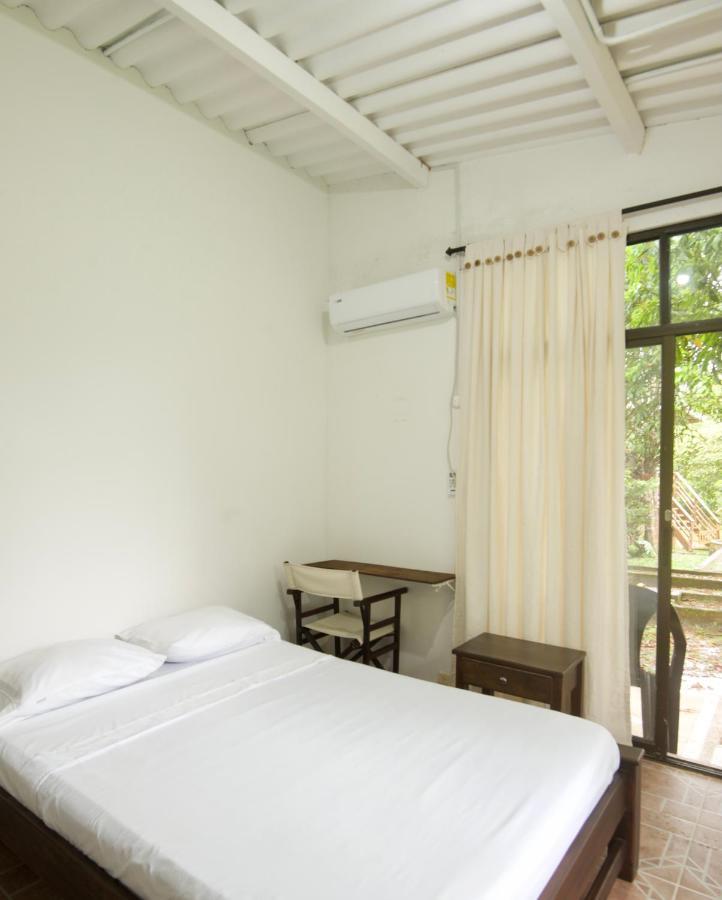 Hostal Suna Vito Puerto Asís Buitenkant foto