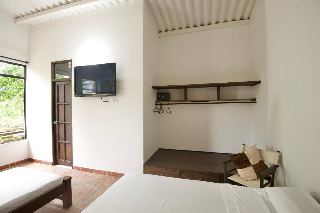 Hostal Suna Vito Puerto Asís Buitenkant foto