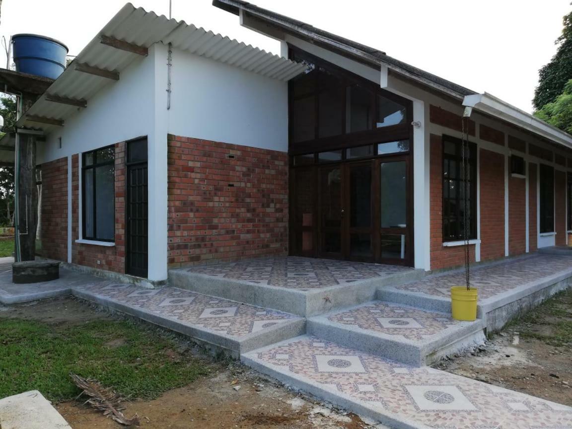 Hostal Suna Vito Puerto Asís Buitenkant foto