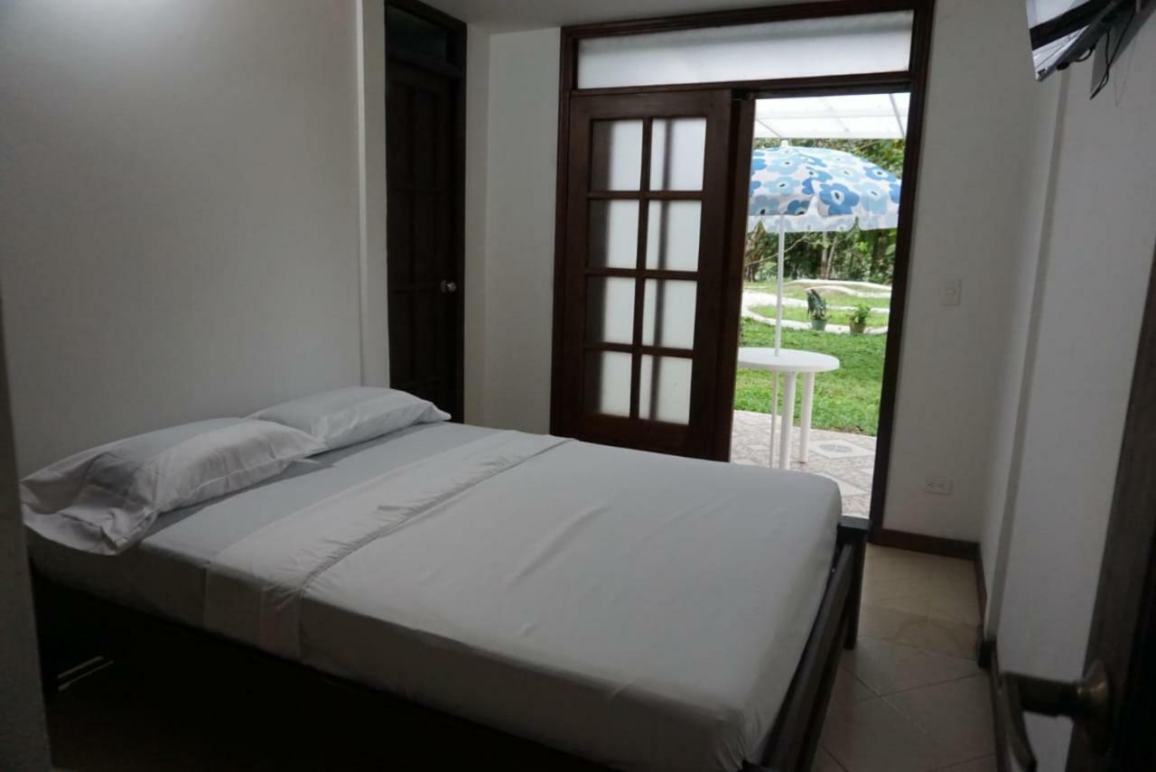 Hostal Suna Vito Puerto Asís Buitenkant foto