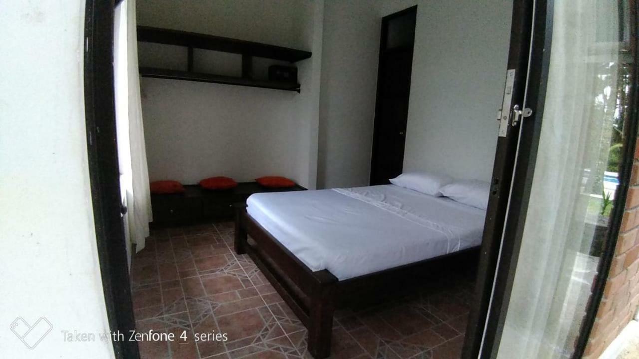 Hostal Suna Vito Puerto Asís Buitenkant foto
